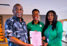 NFF President Presents Plot of Land Certificate to Super Falcons Goalkeeper Chiamaka Nnadozie